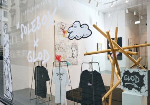 Glod Art - Exhibition and Cooperation with Solebox Store Art Space in Vienna. Store Window with Artworks and T-Shirts by Glod.