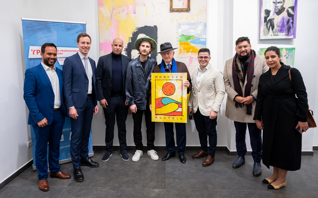 Rafi Rahman, Nico Marchetti, Dodi Elsayed, Marcin Glod, André Azoulay, Ivo Radwan, Marouane El Idrissi und Nadia Bouaida mit dem Gemälde